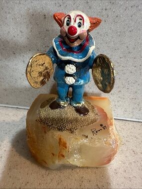 Ron Lee hand painted clown playing cymbals with gold accents on marble base 87